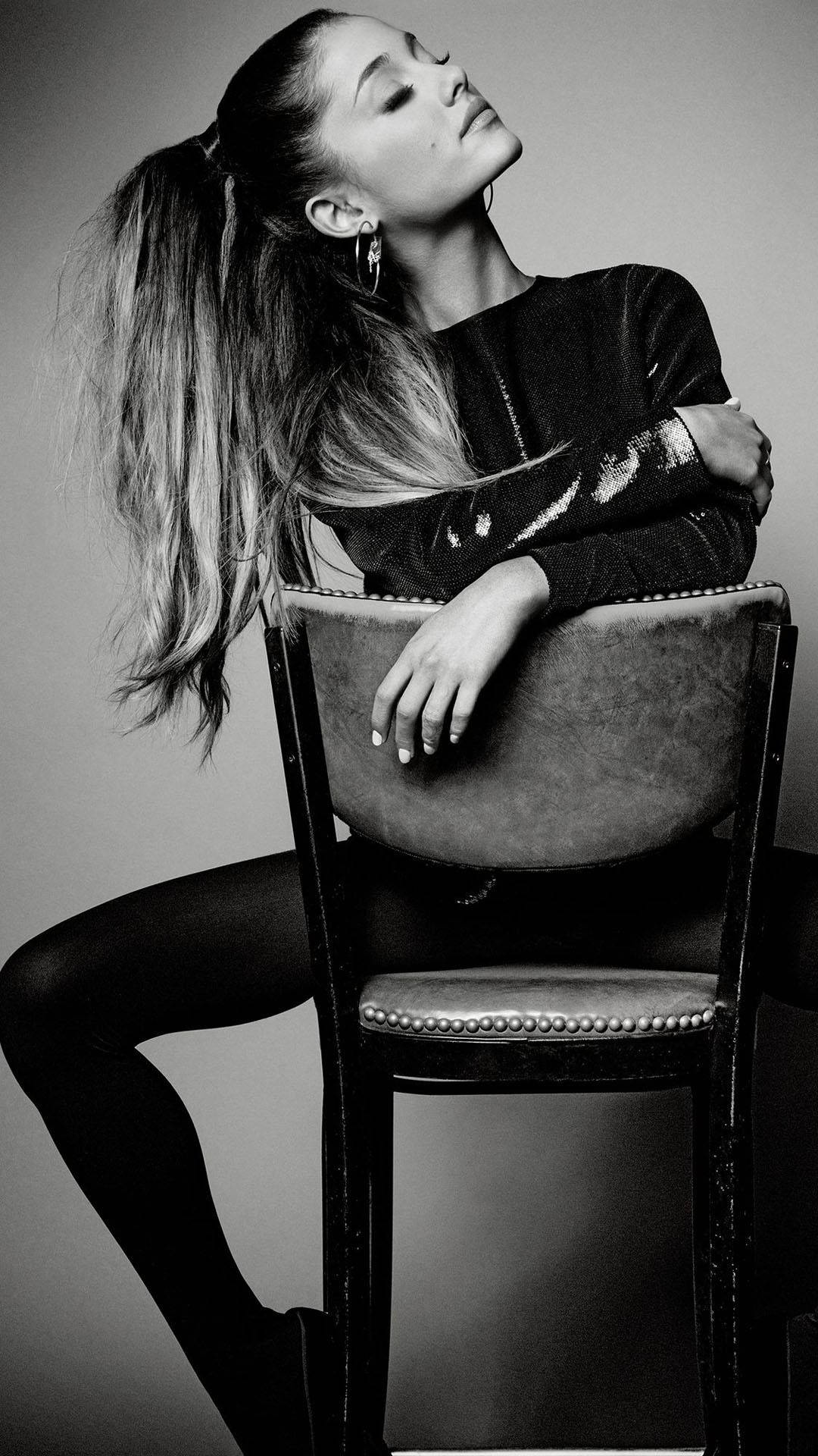 Black Ariana Grande On Chair Background
