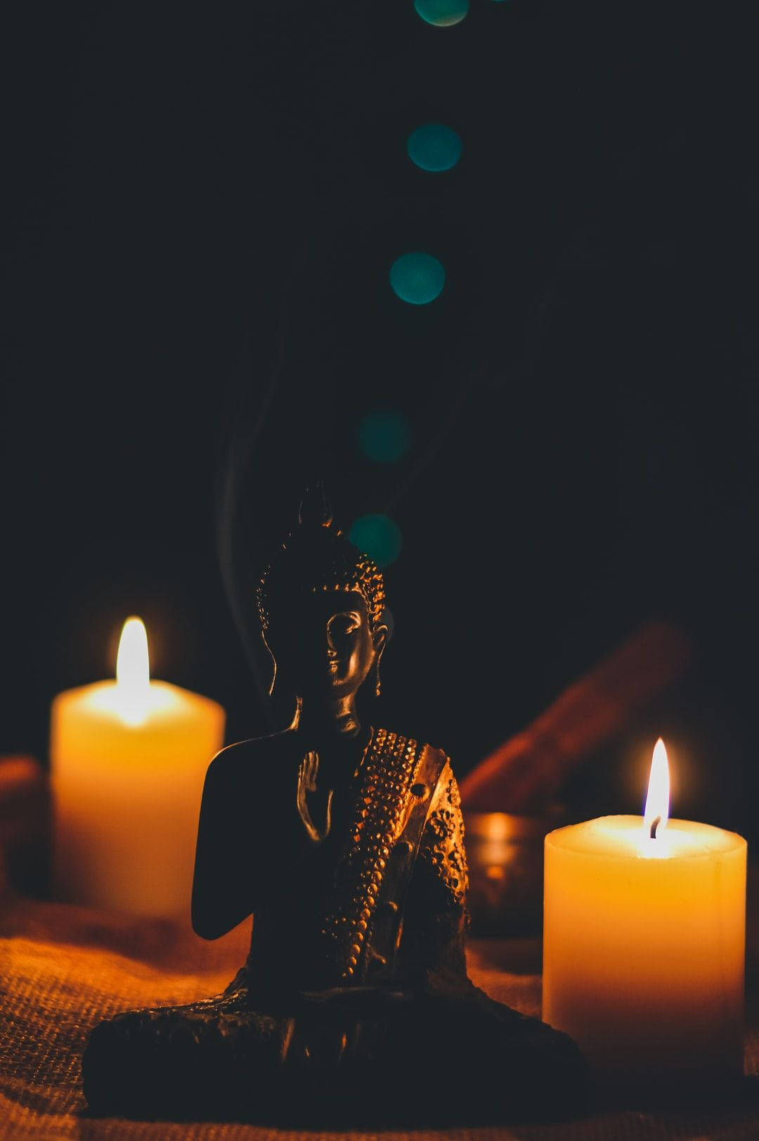 Black Buddha Candles Background