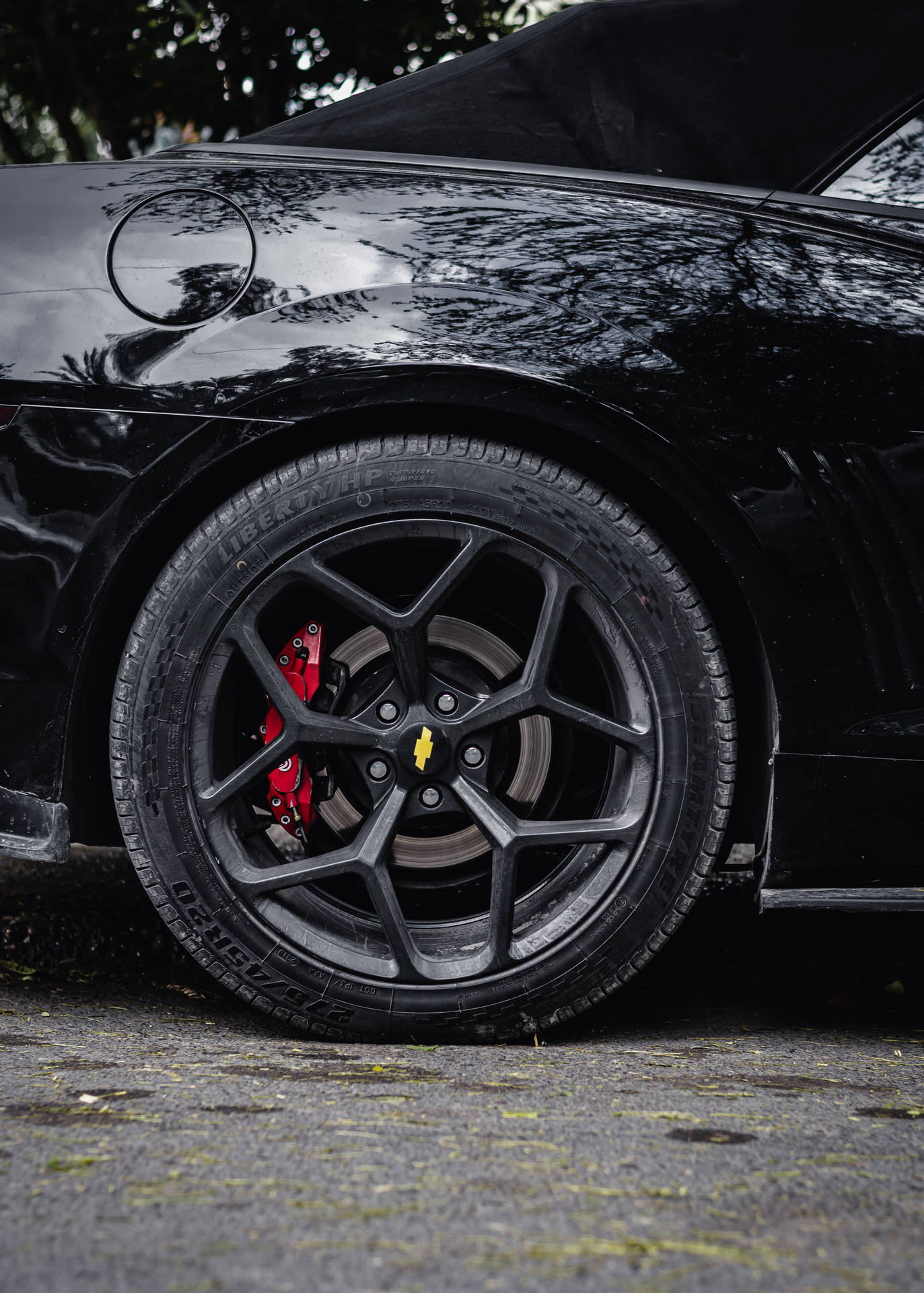 Black Chevrolet Rim Background