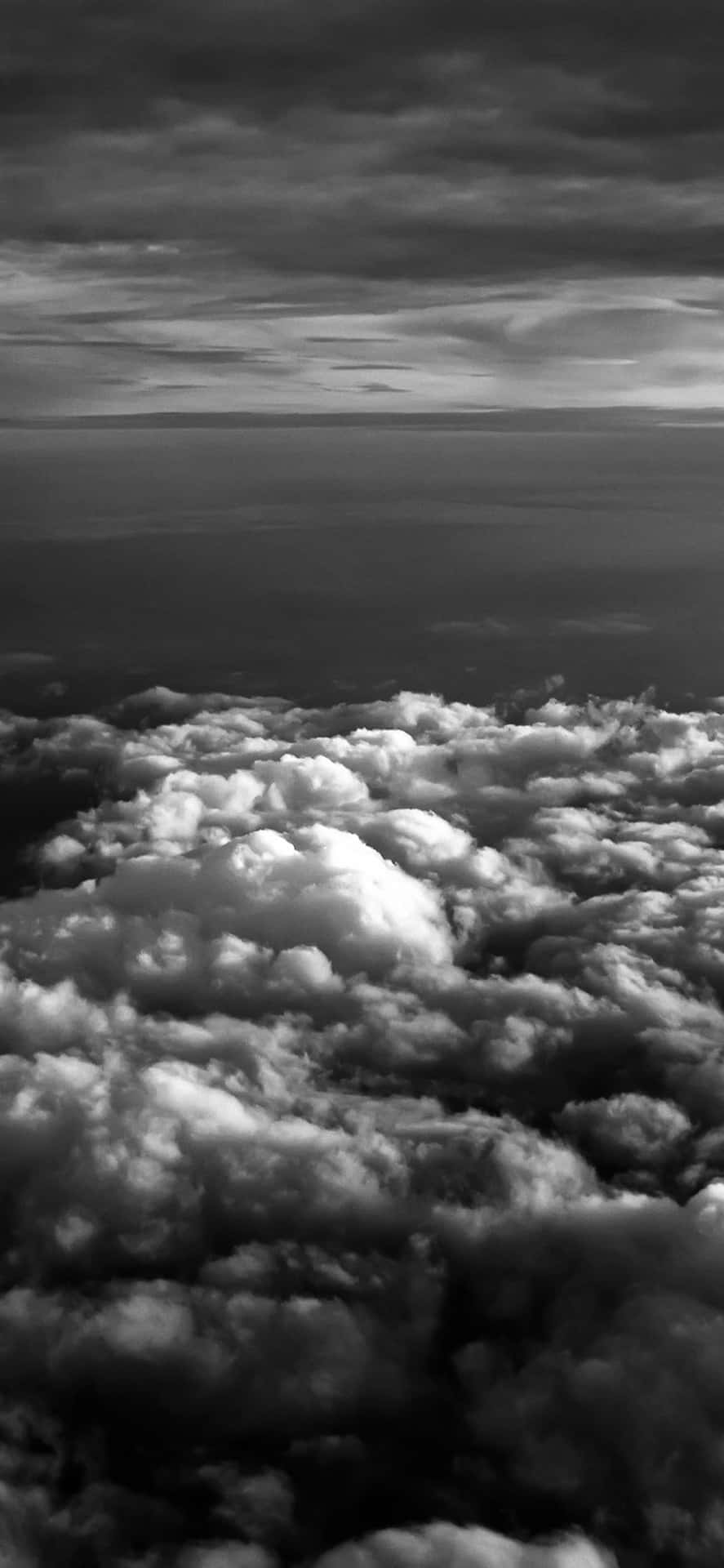 Black Clouds Approaching The Sea Background