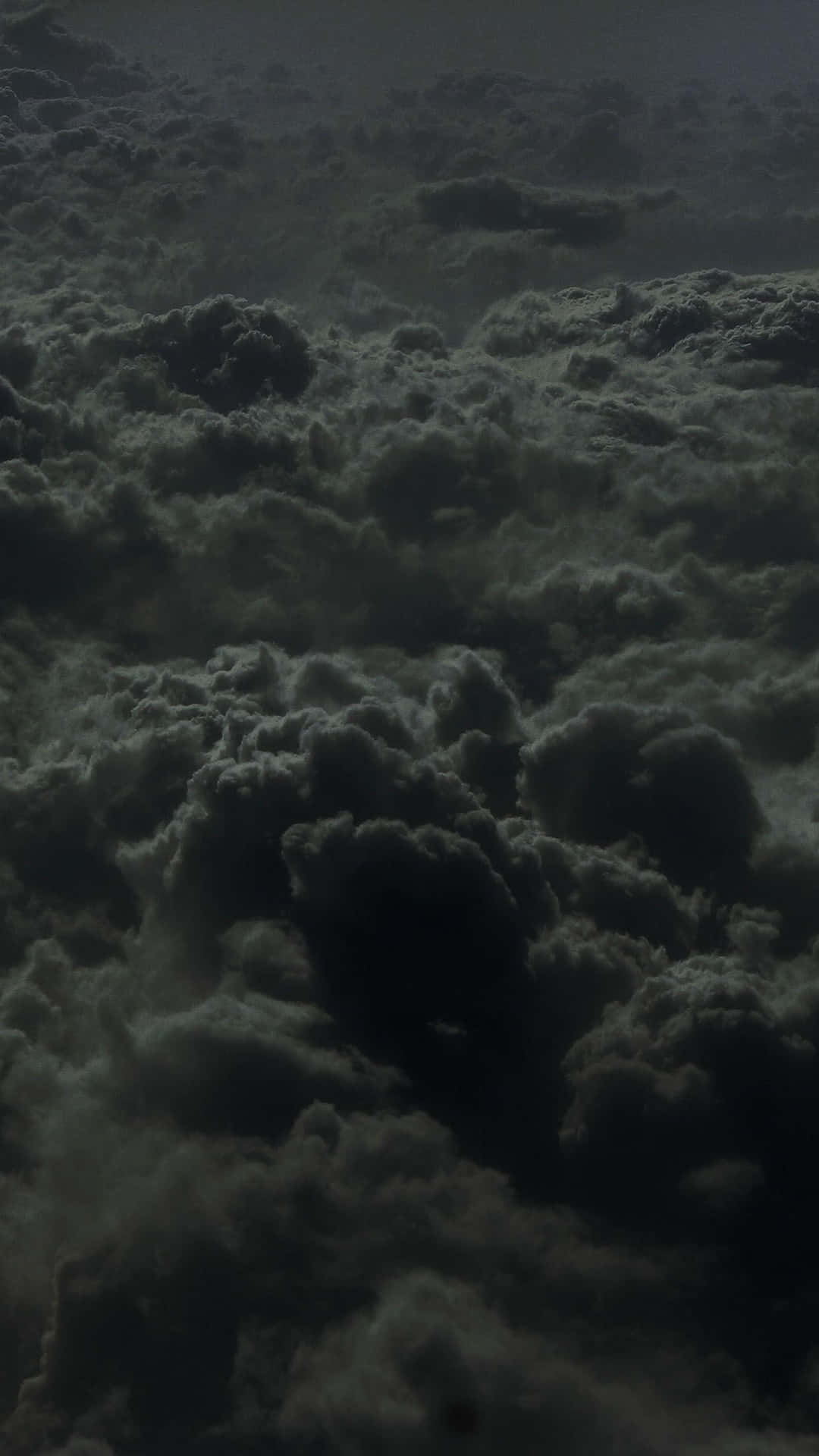 Black Clouds Covering A Vast Area Background