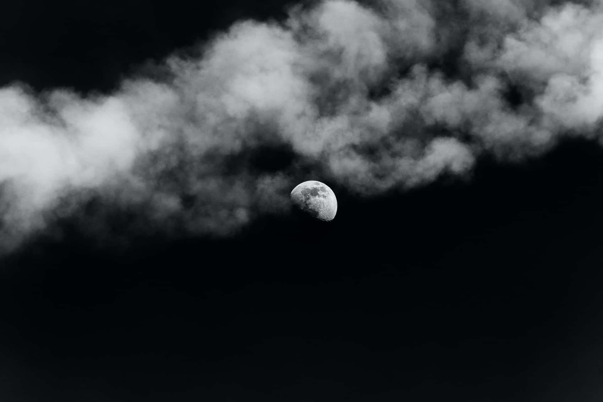 Black Clouds With The Moon Background