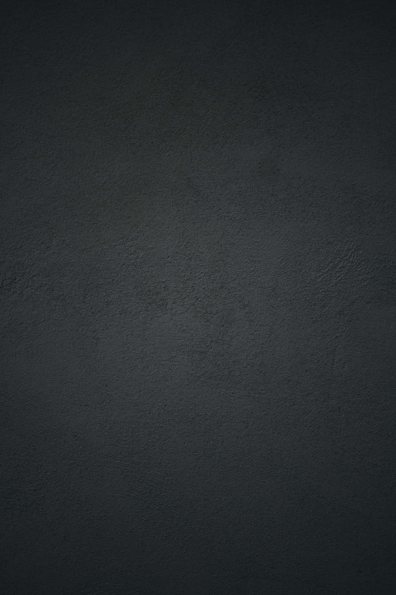 Black Concrete Wall Background With A Light Reflection Background