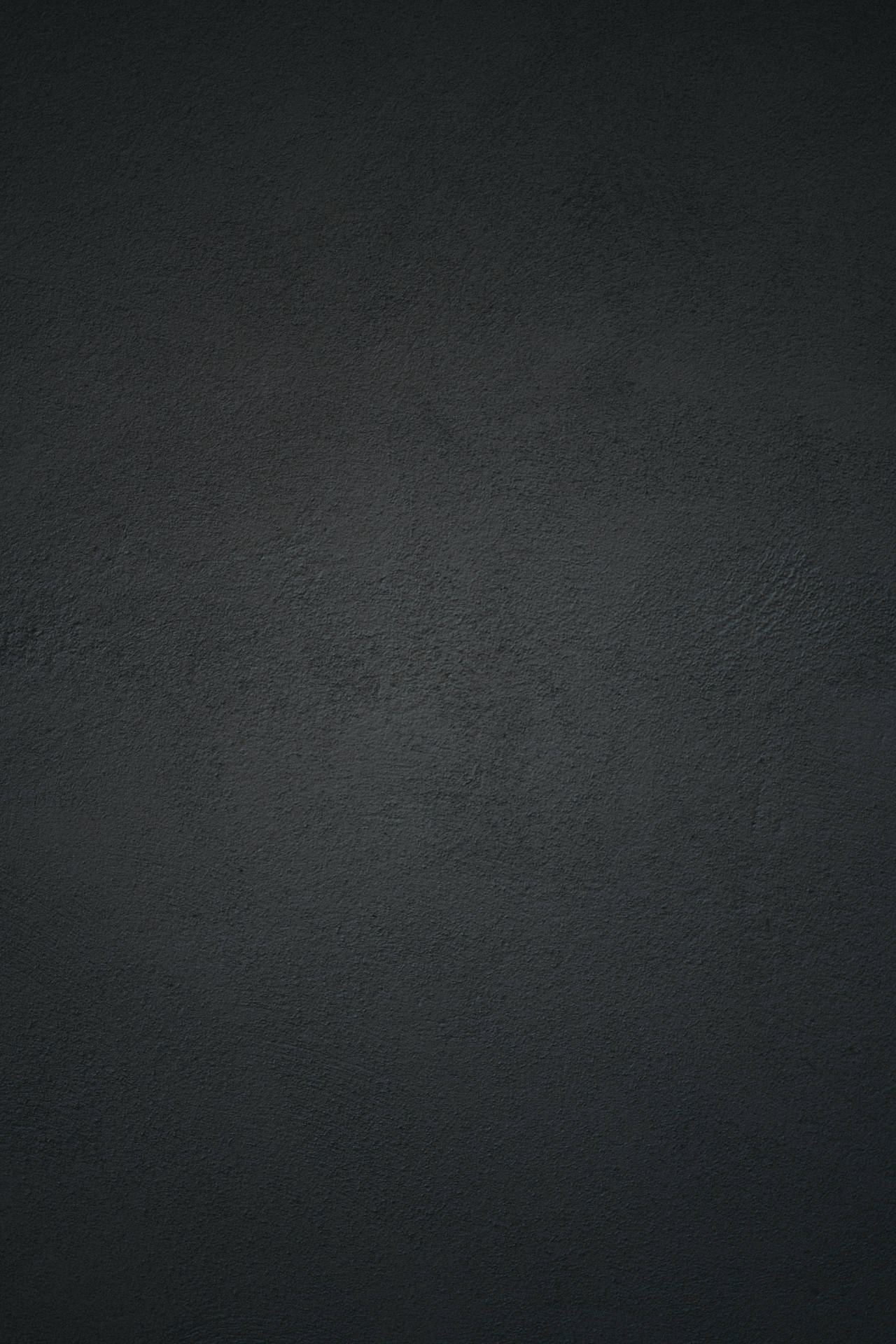 Black Concrete Wall Background With A Light Reflection Background