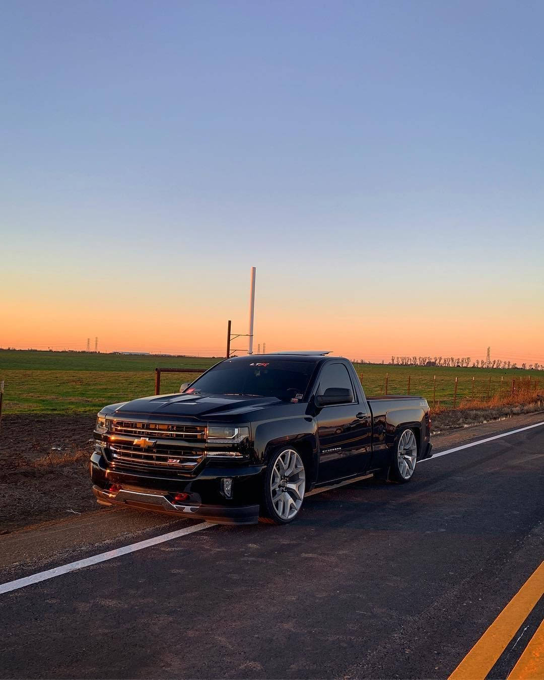 Black Dropped Truck Golden Hour Background