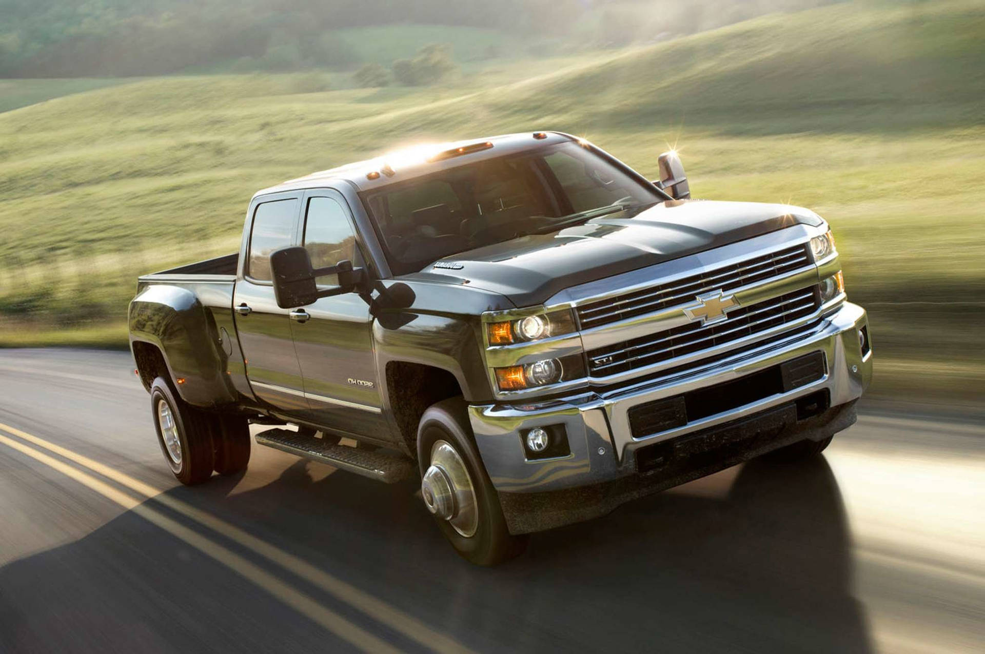 Black Duramax Along The Road Background