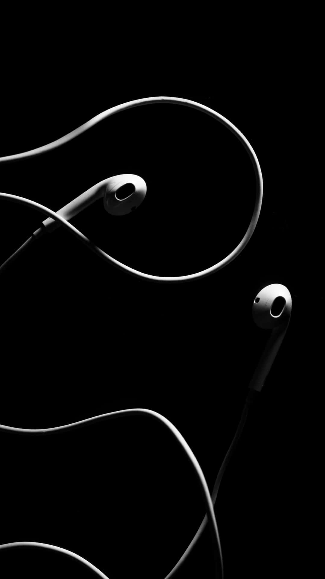 Black Earphones Artistic Display Background