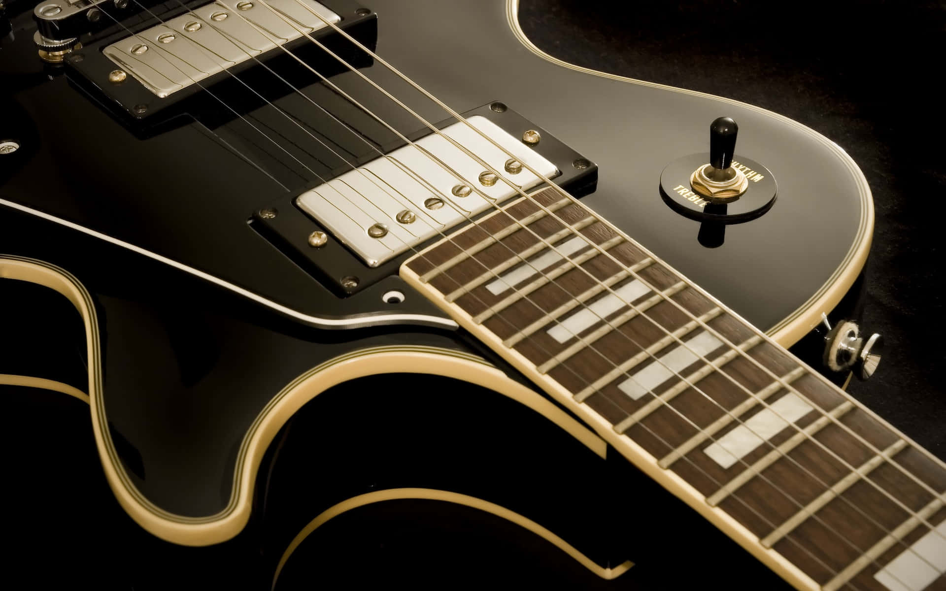 Black Electric Guitar Closeup Background