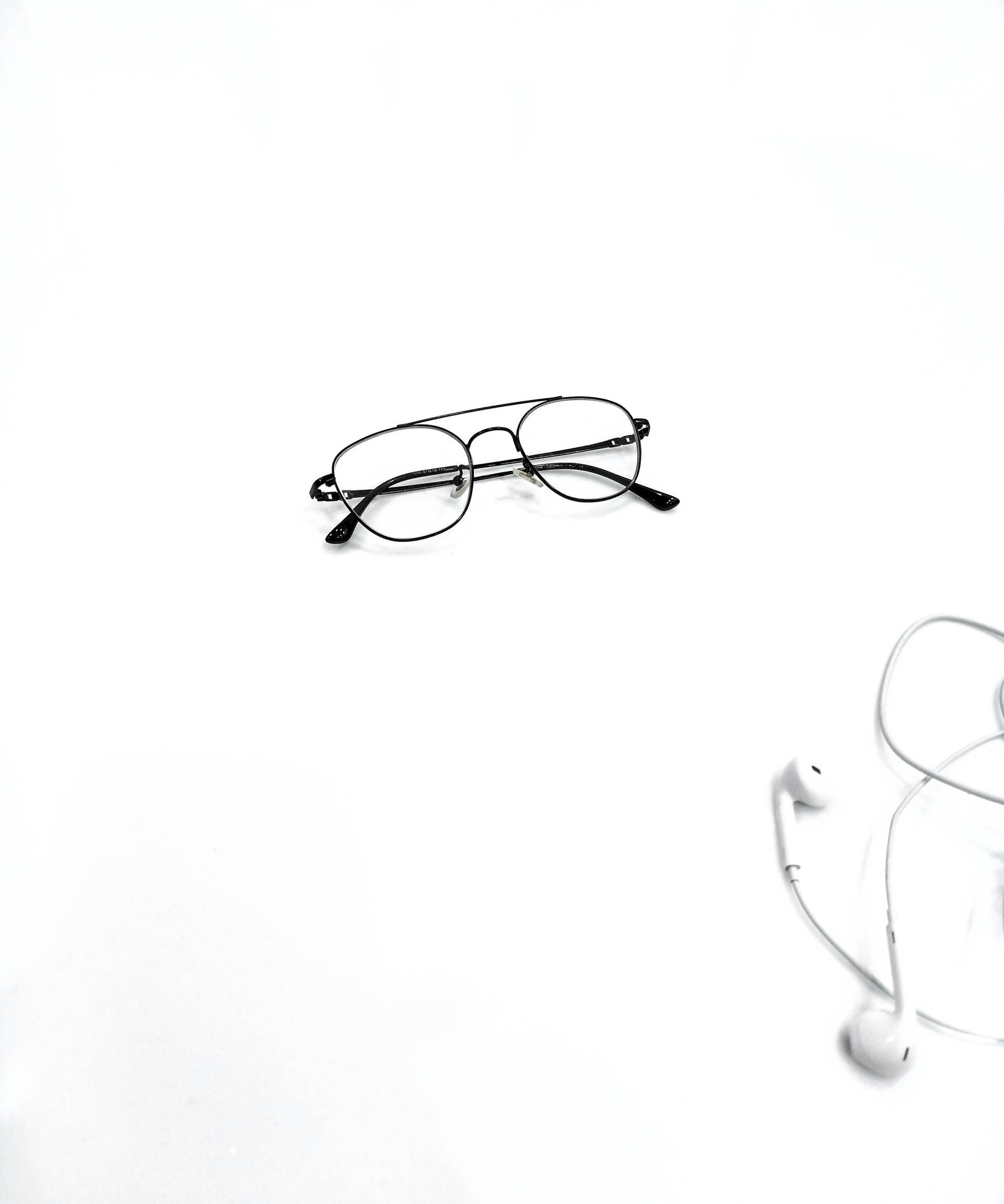 Black Eyeglasses And Headset Plain Aesthetic Background