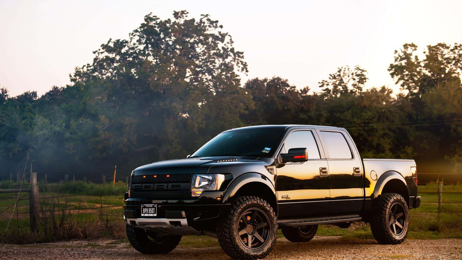 Black Ford Raptor Lifted Truck Background