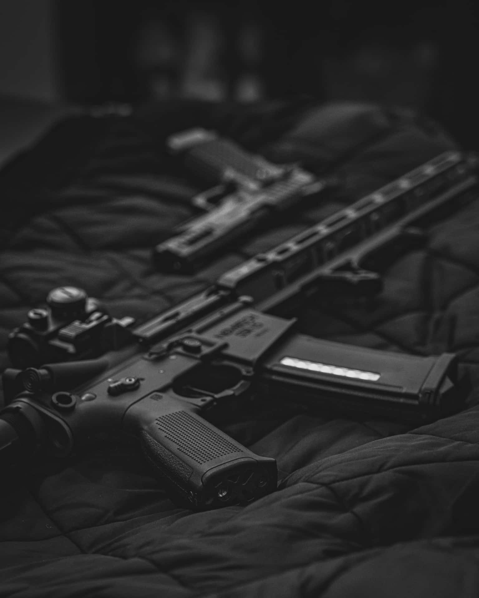 Black Gangster Rifle On Bed Background