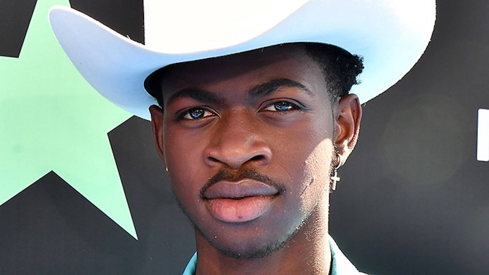 Black Gay Man Lil Nax X In A White Cowboy Hat