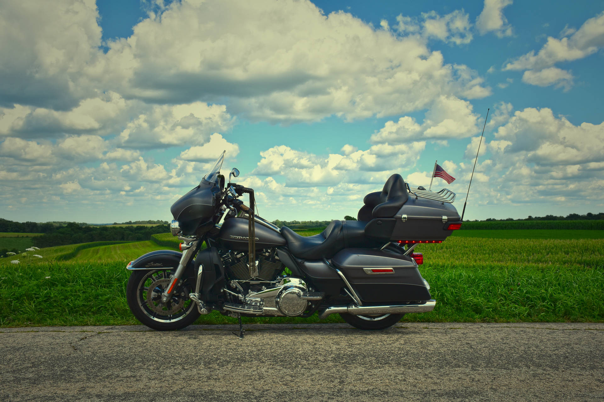 Black Harley Davidson With Clouds Background