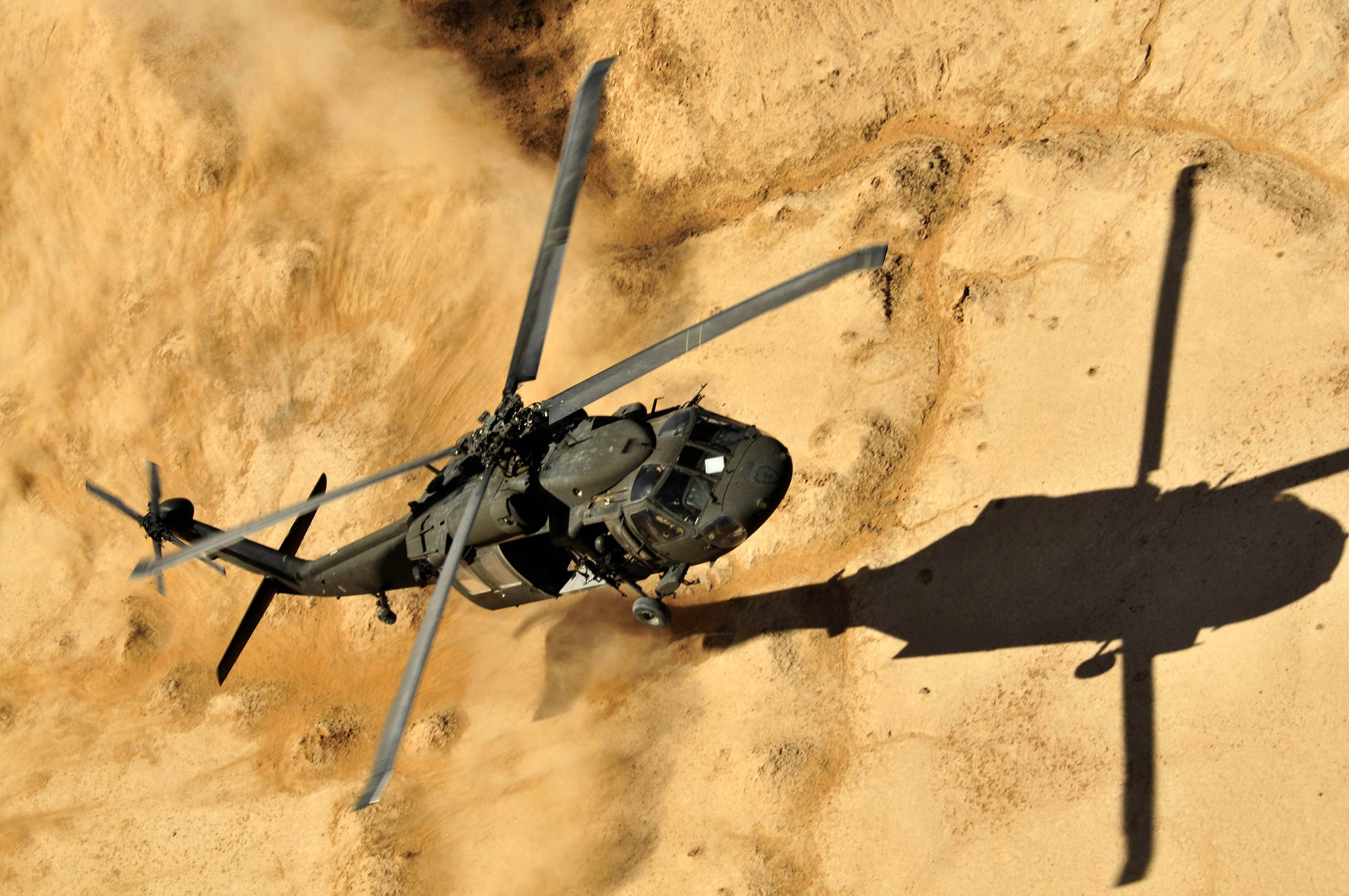 Black Hawk Helicopter Dust Landing Background