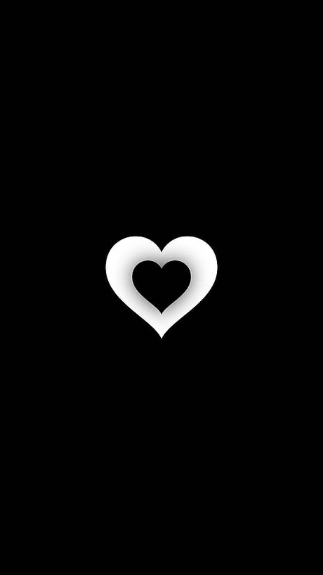 Black Heart On A White Heart Background