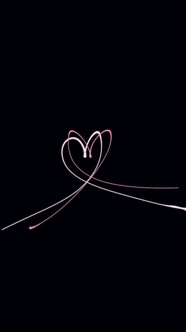 Black Heart Shape With A Floral Background