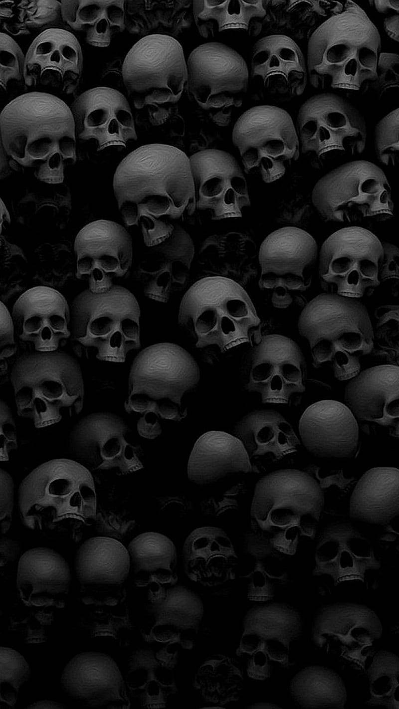 Black Horror Pile Of Skulls Background