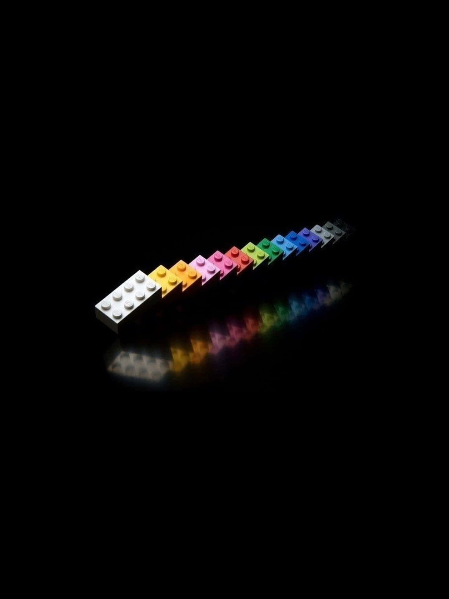 Black Ipad With Colorful Legos With Reflection Background