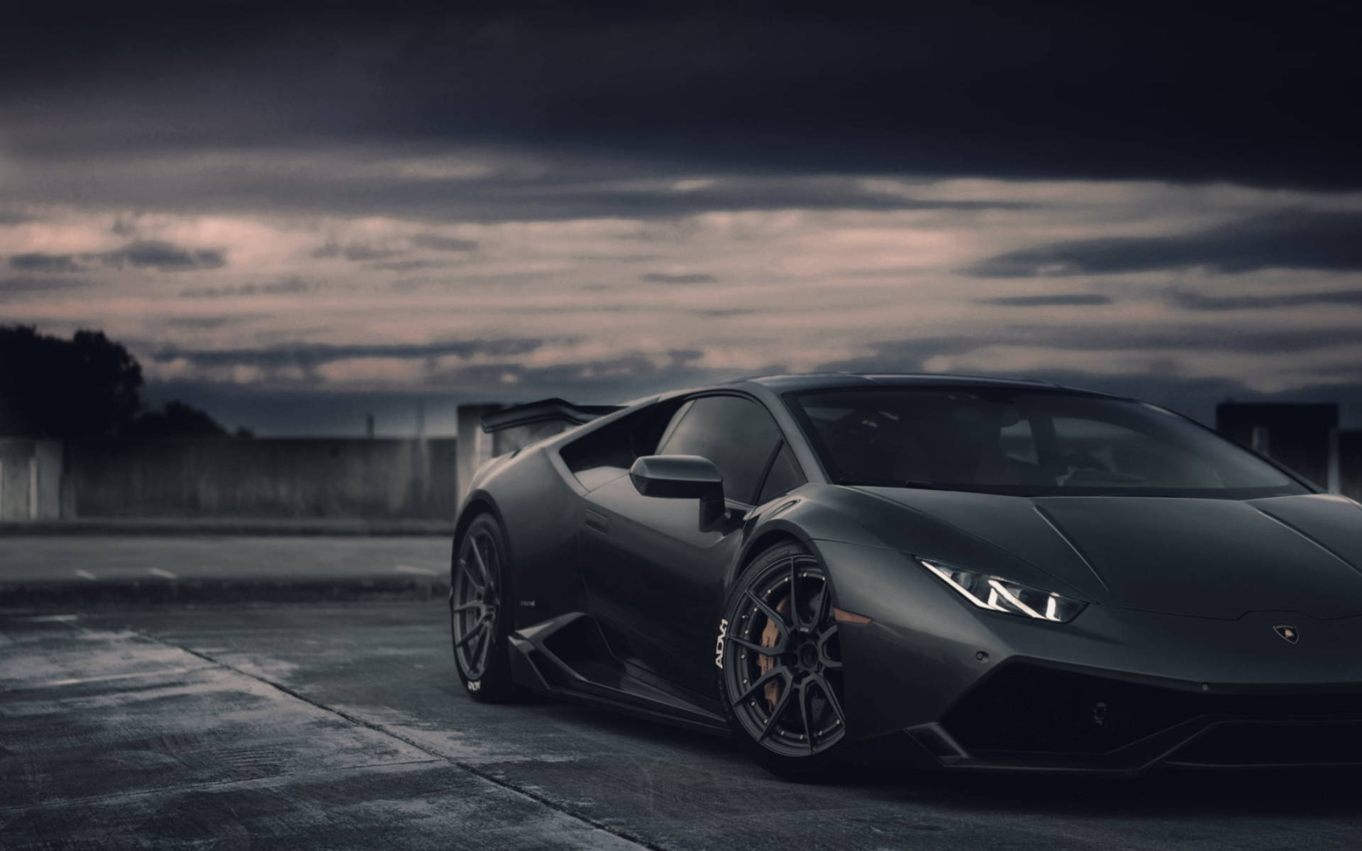 Black Lamborghini Dark Skies Background