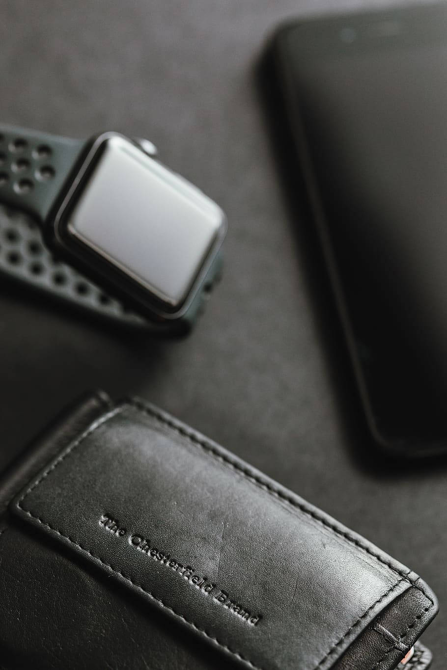 Black Leather Iphone Wallet And Watch Background