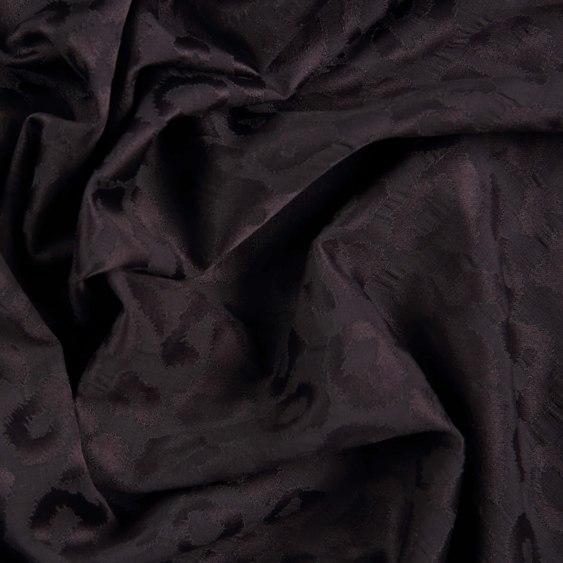 Black Leopard Print Fabric Texture Background