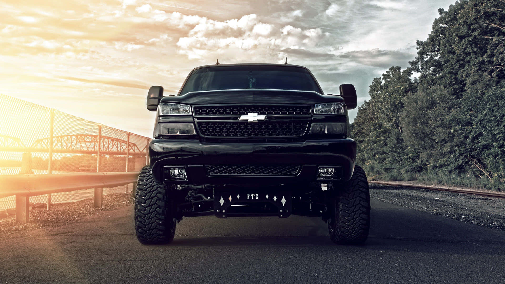 Black Lifted Truck Full Front View Background