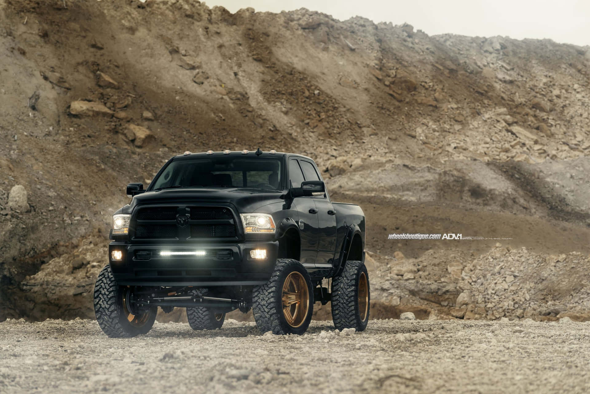 Black Lifted Truck On Dirt Field Background