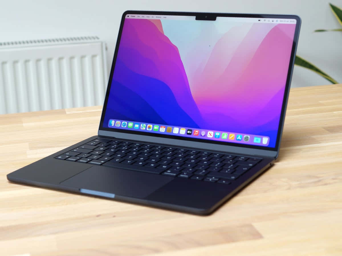 Black Macbook - Designed To Do It All Background