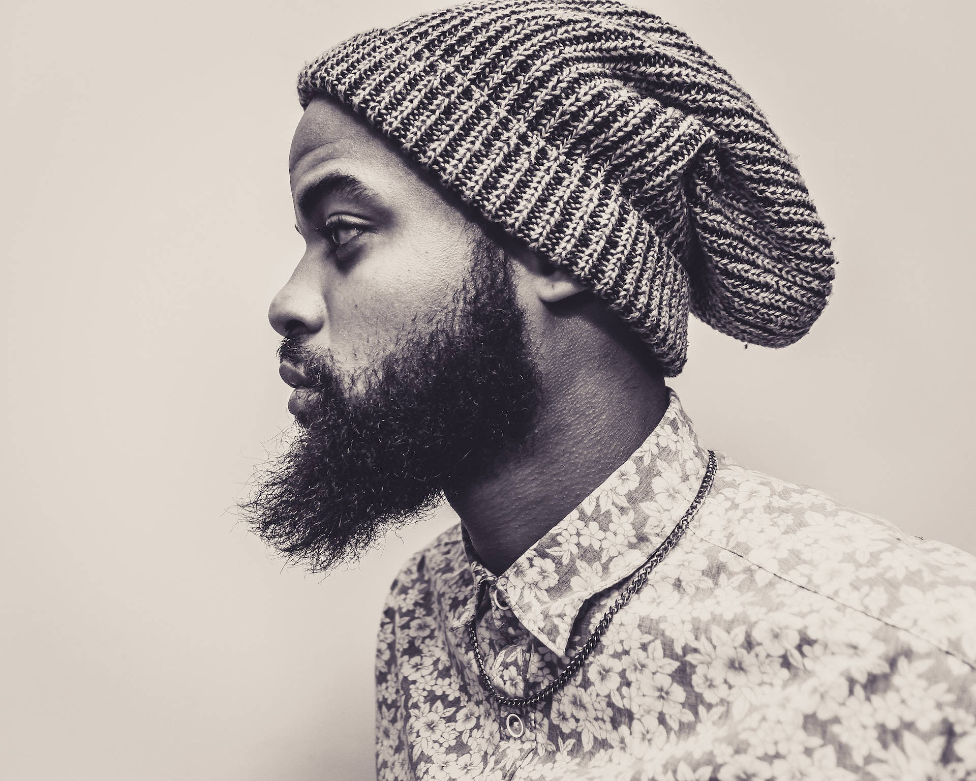 Black Man With A Bonnet On Background