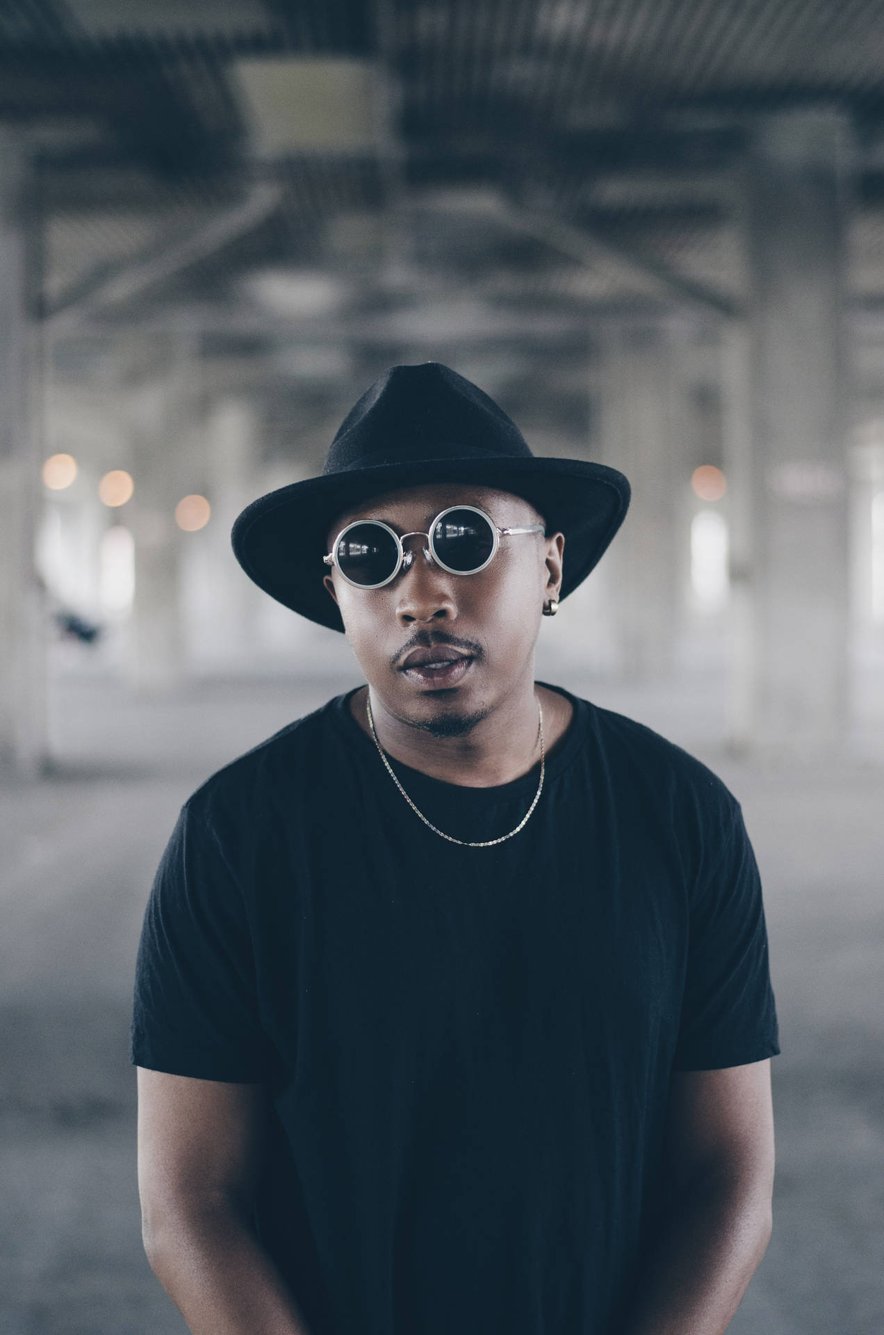 Black Man With A Fedora Hat And Windsor Sunglasses Background