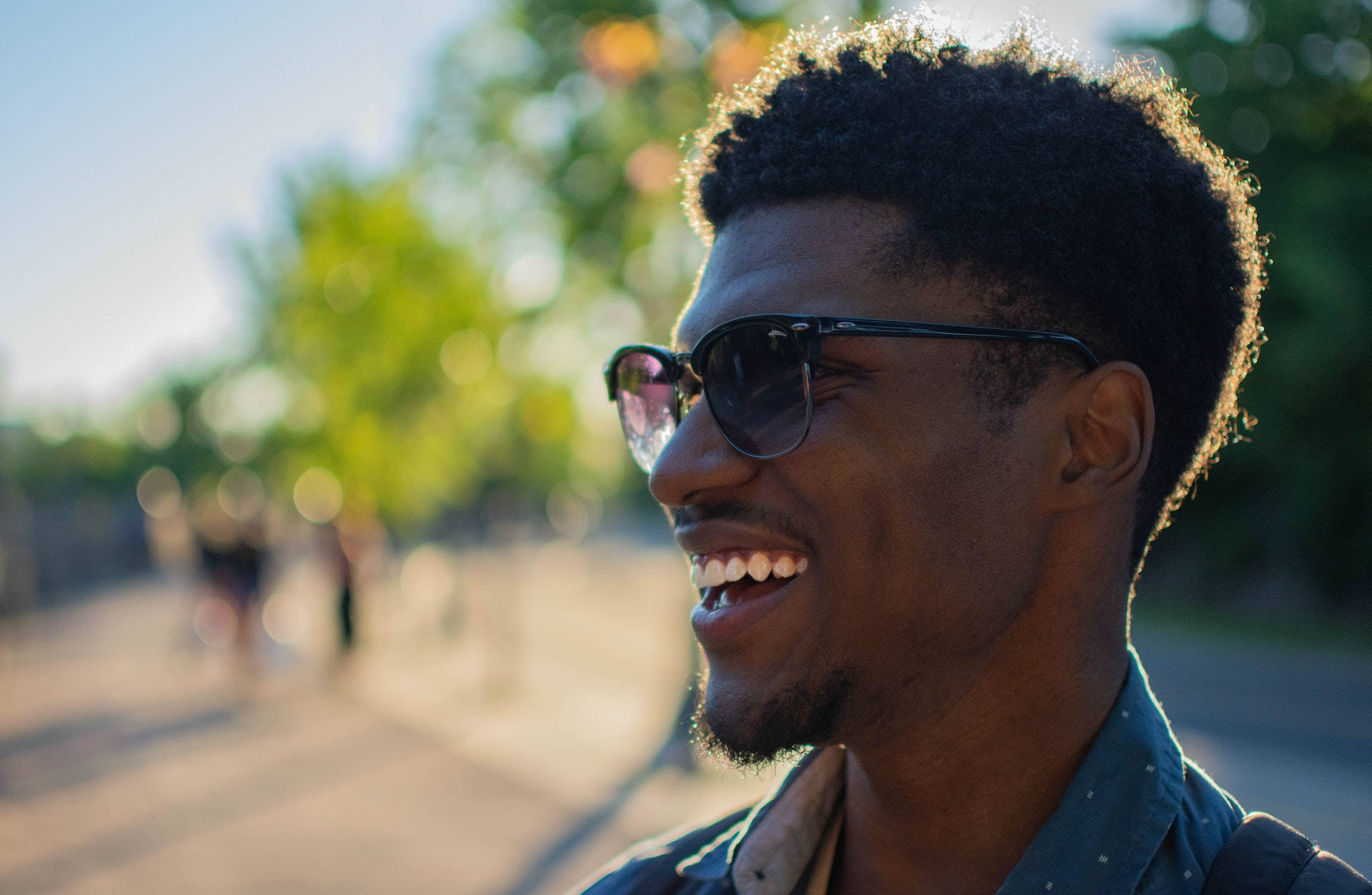 Black Man With A Wide Grin Background