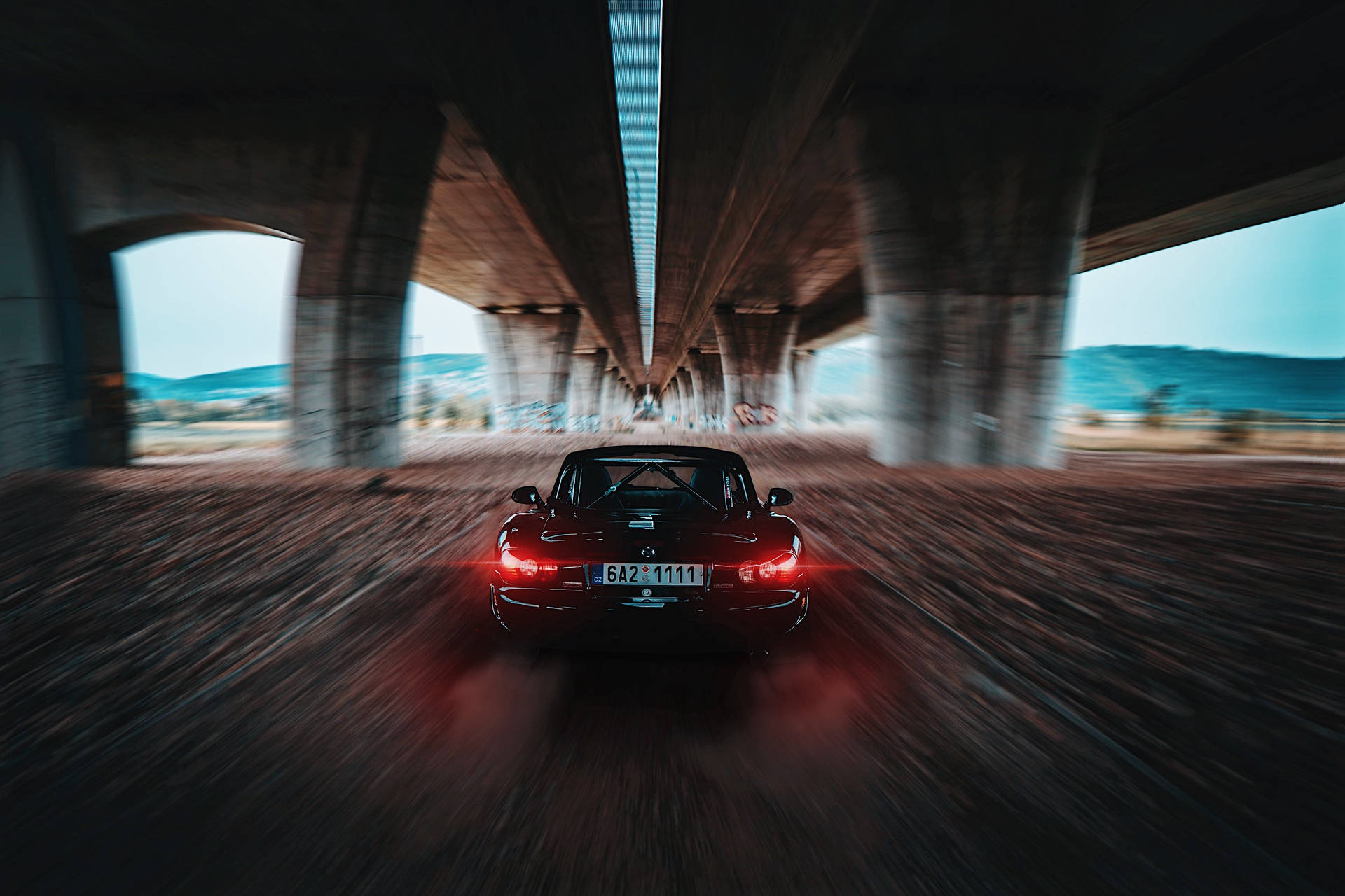 Black Mazda Mx-5 Driving Background