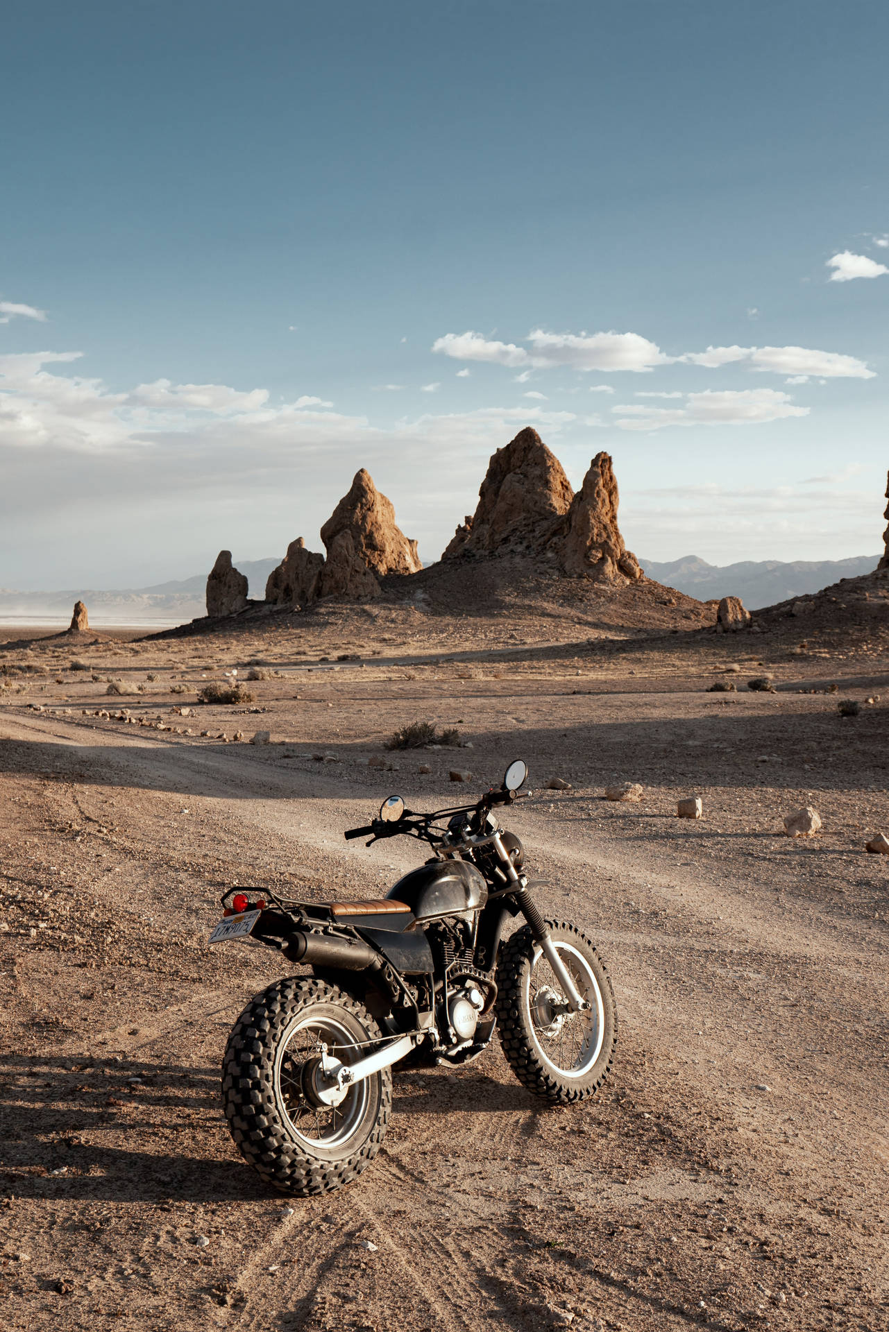 Black Motorcycle In Terrains Background