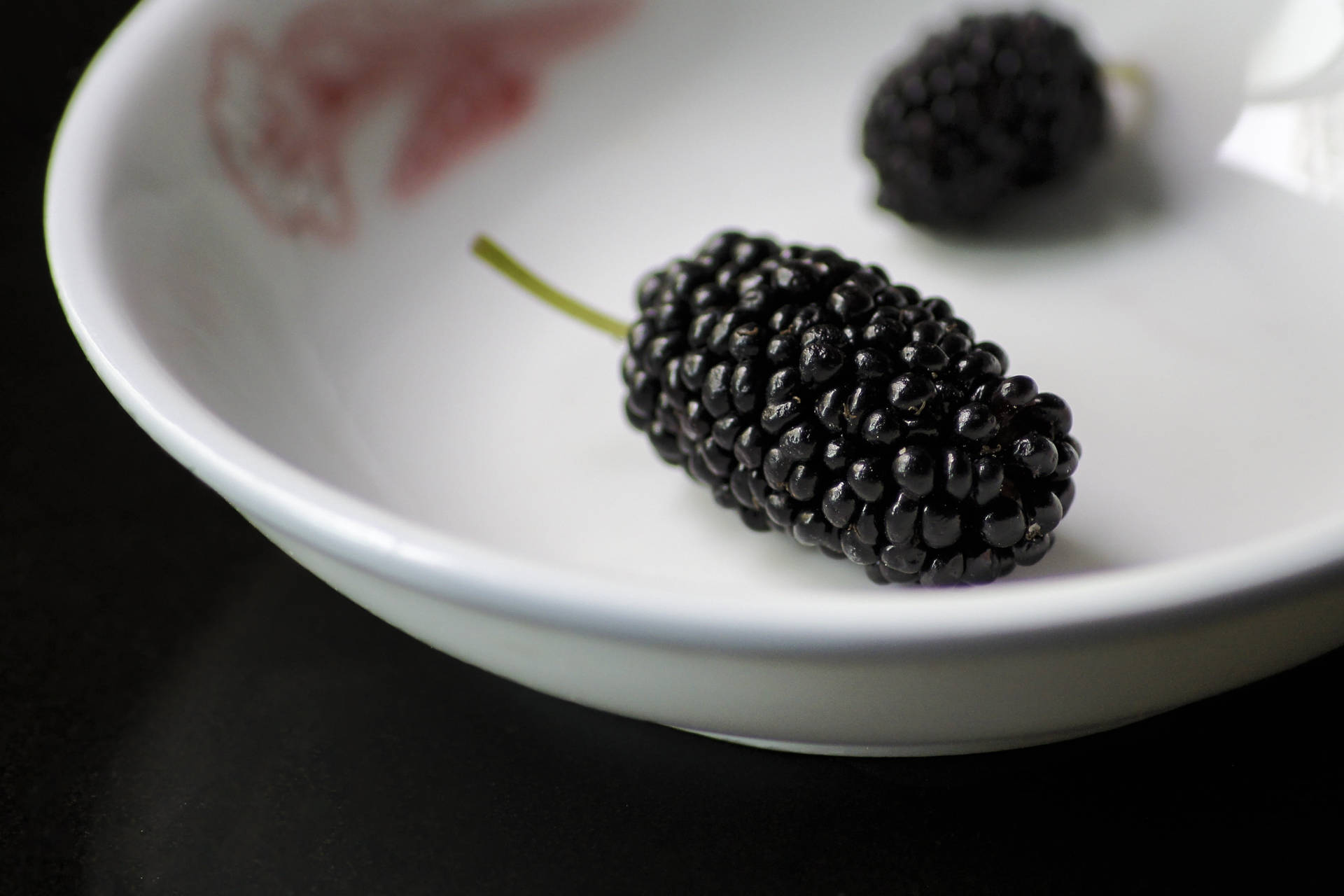 Black Mulberry Fruit On Plate Background