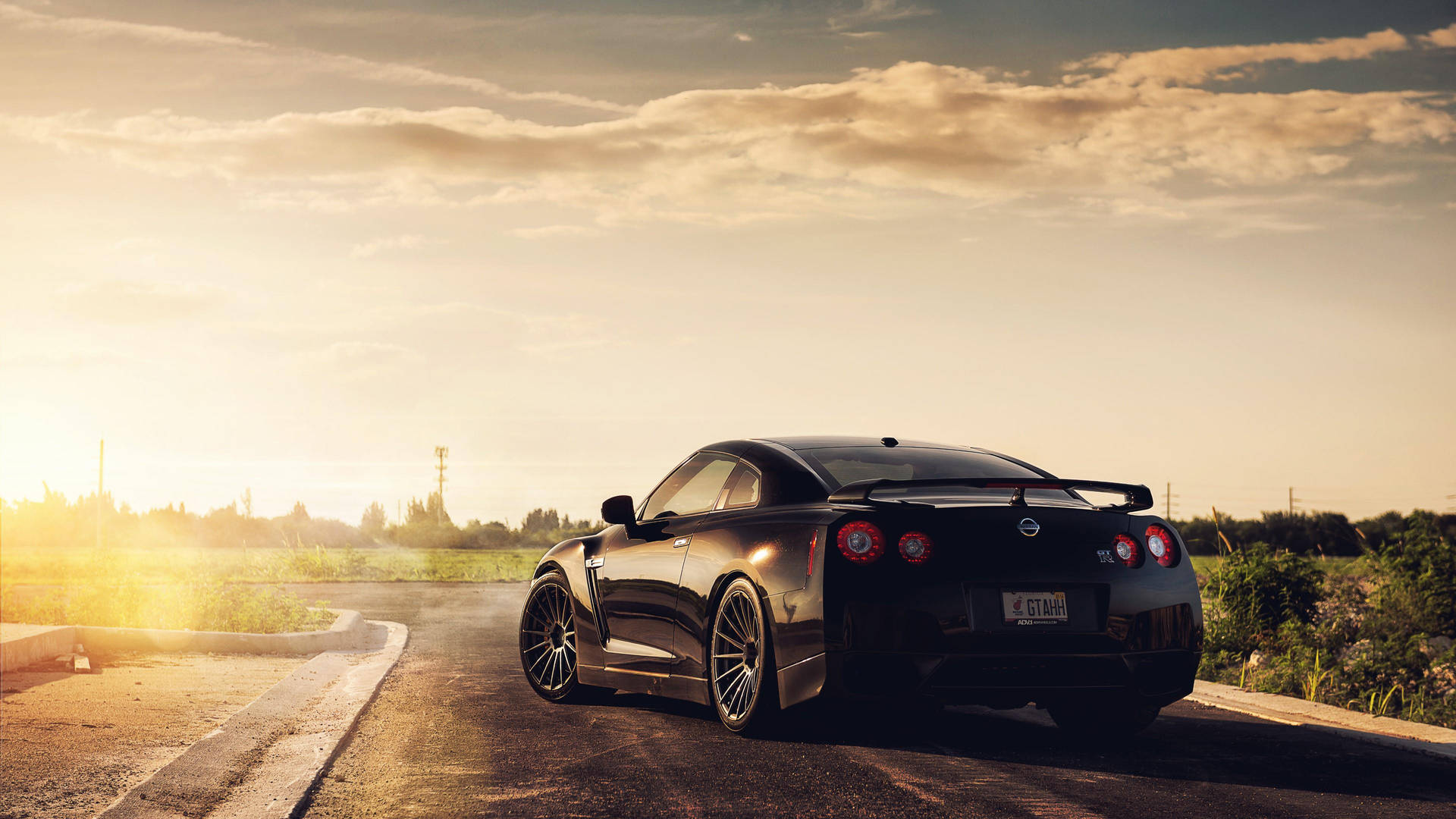 Black Nissan Gtr Car During Sunset