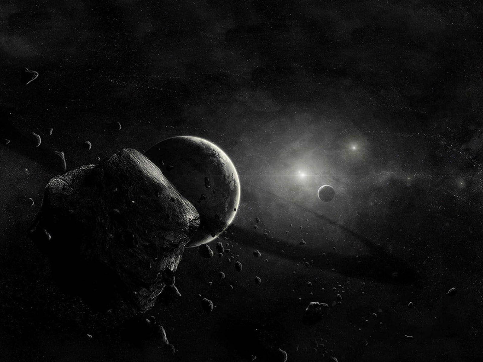 Black Planet Behind Asteroid Background