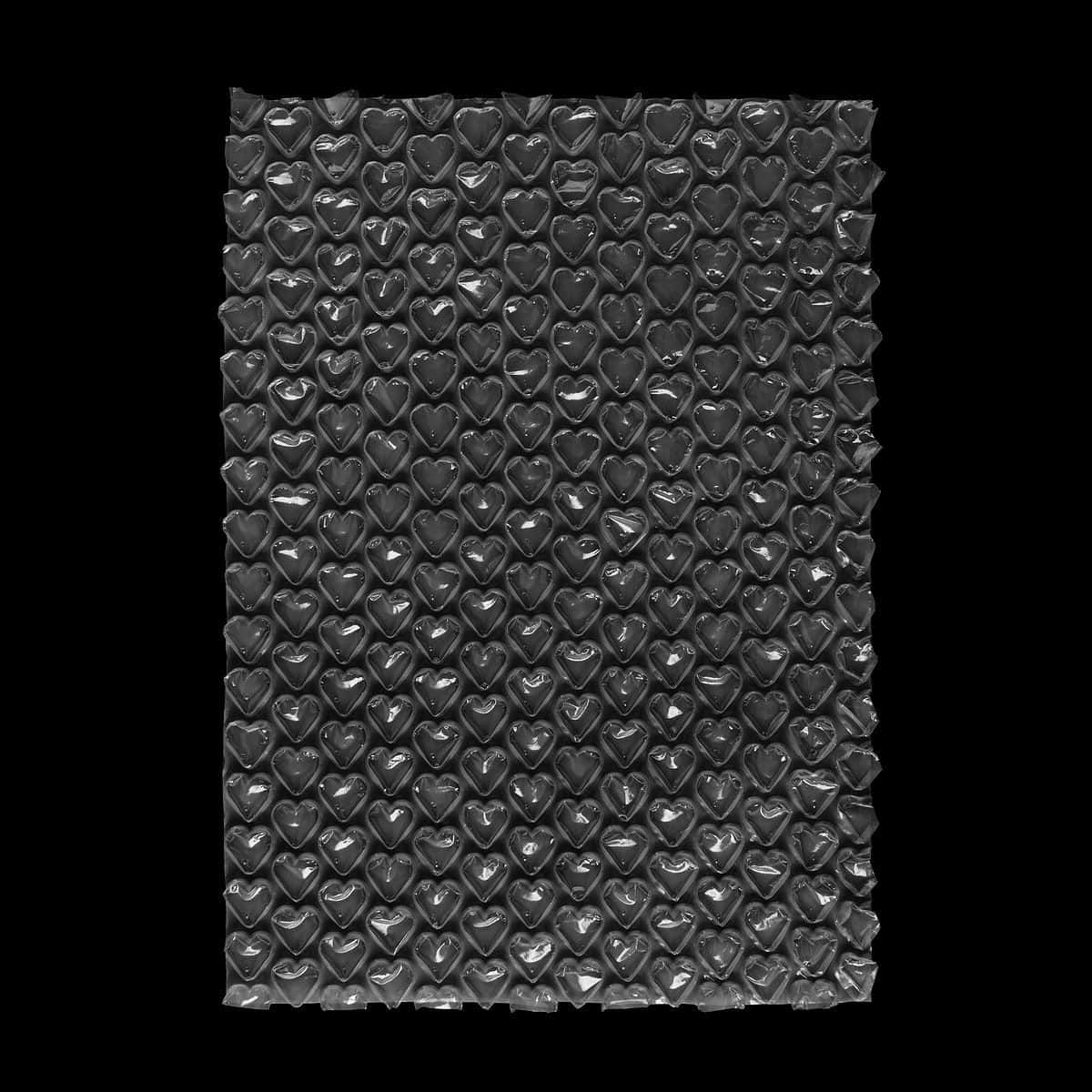 Black Plastic Bubble Wrap Hearts Background