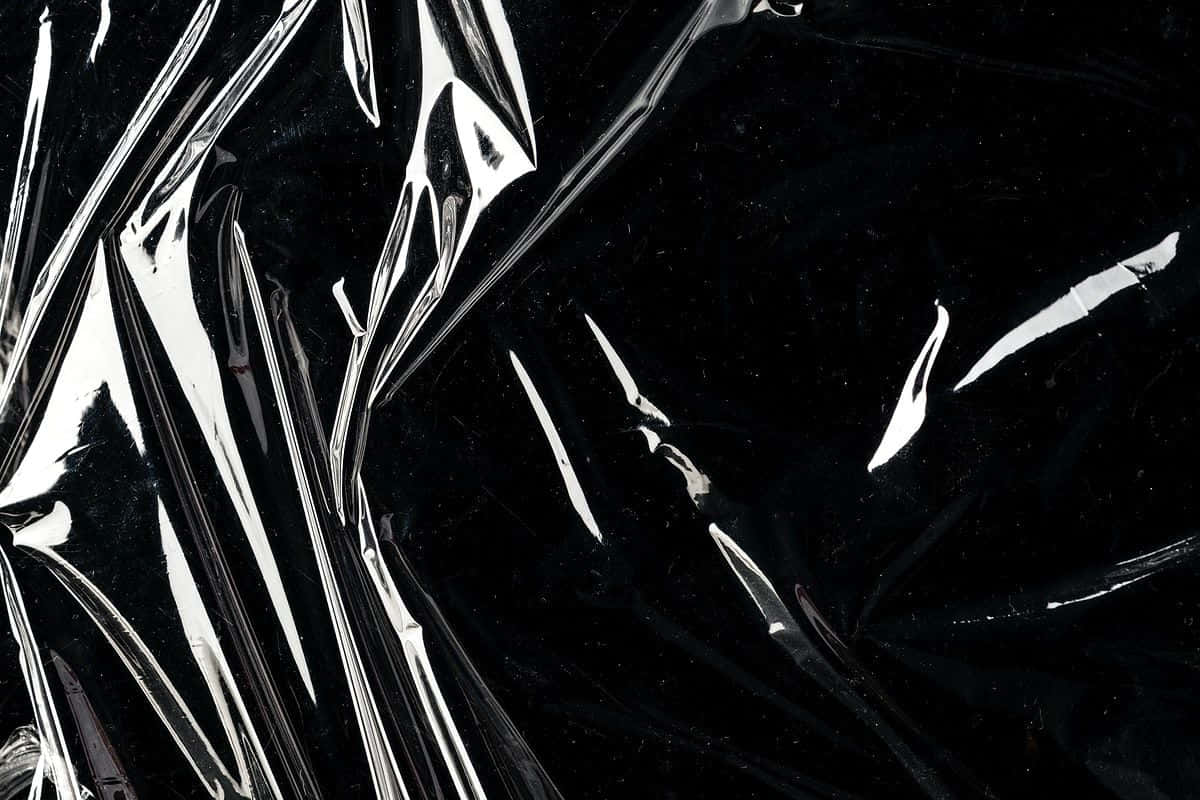 Black Plastic Glossy Crumpled Background