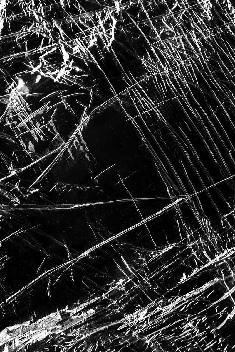 Black Plastic With Scratches