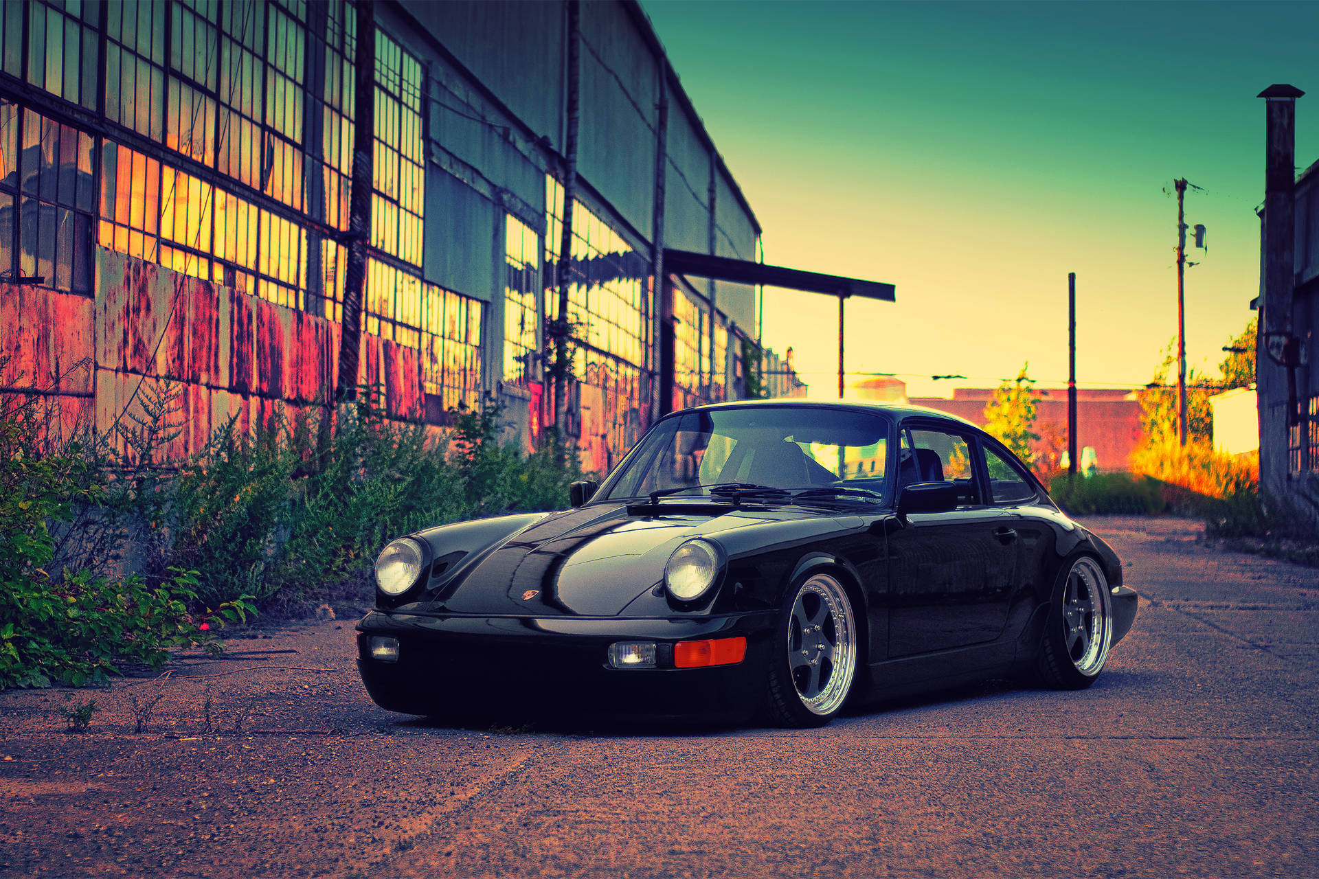 Black Porsche 964 In Sunset Background