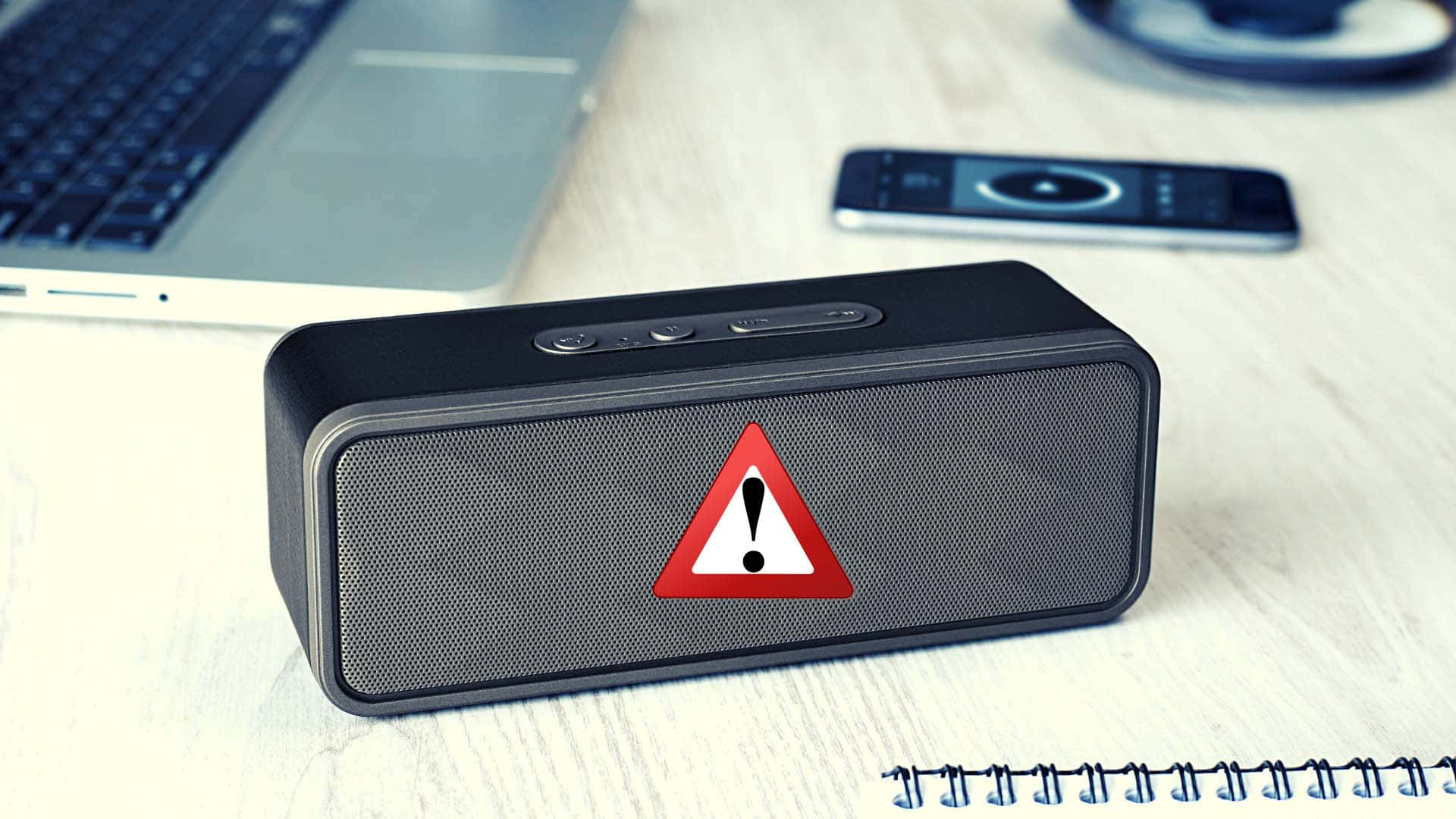 Black Portable Speaker With Exclamation Warning Illustration