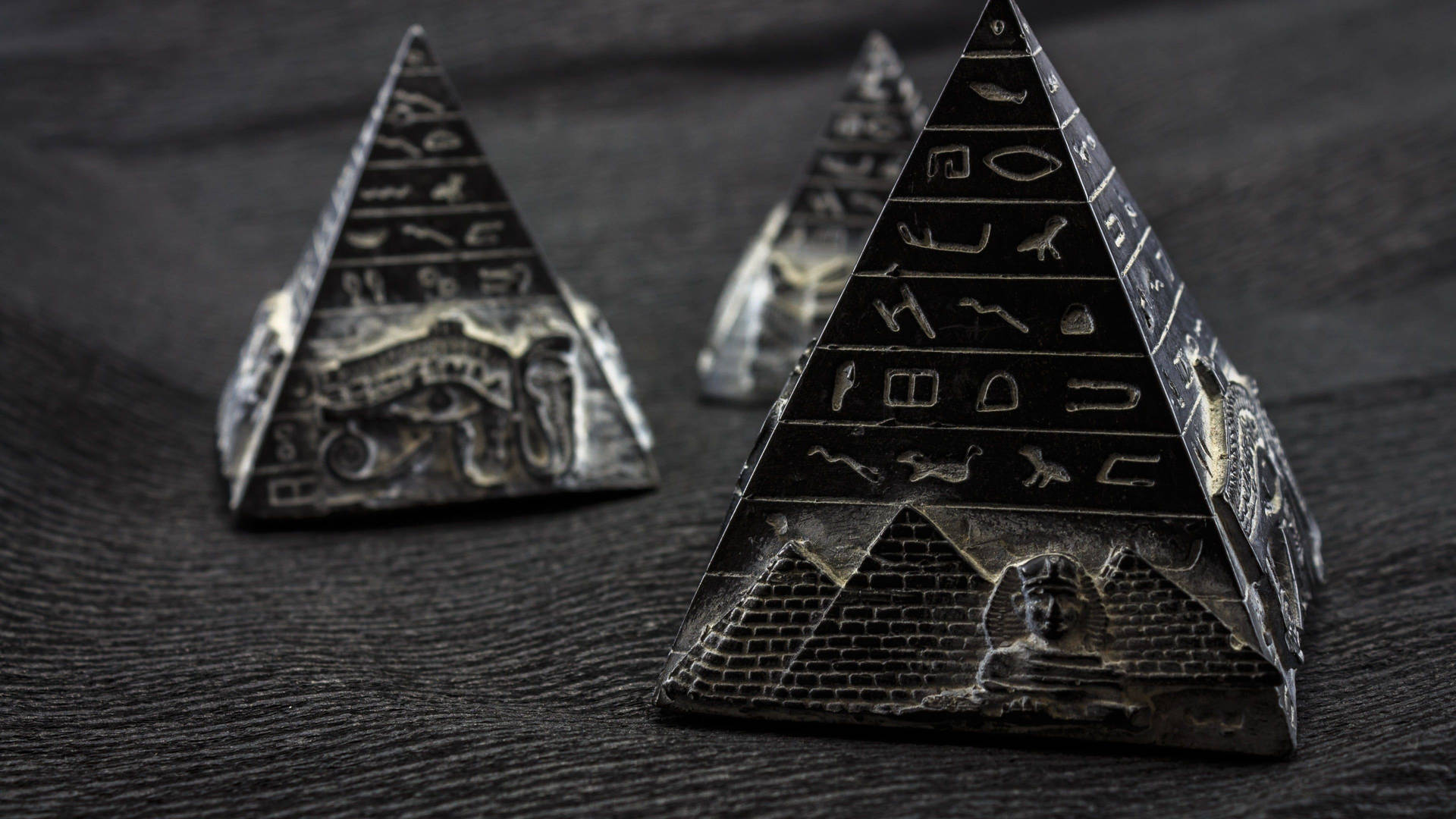 Black Pyramid With Hieroglyphs Background