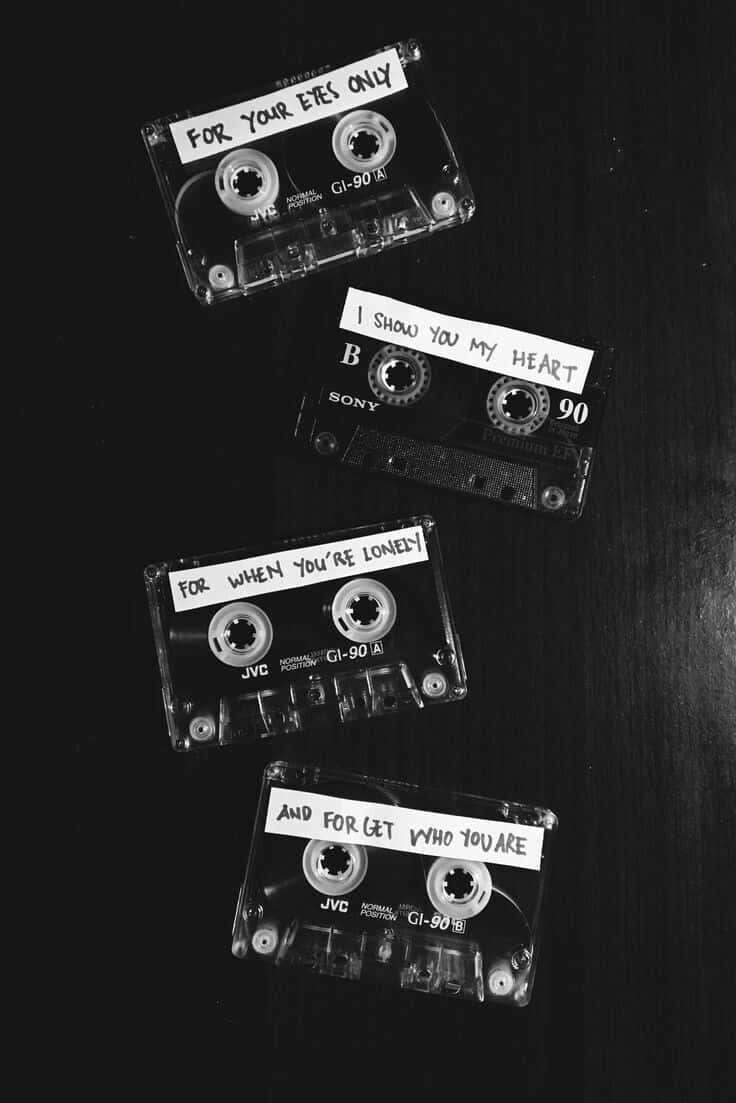 Black Retro Cassette Tapes Background