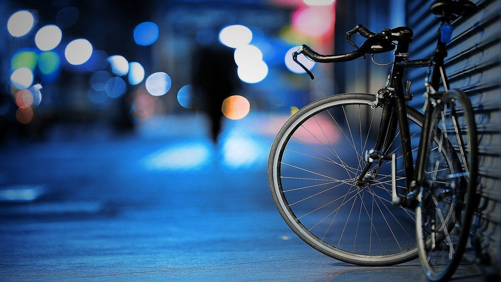 Black Road Bike In Bright Street Background