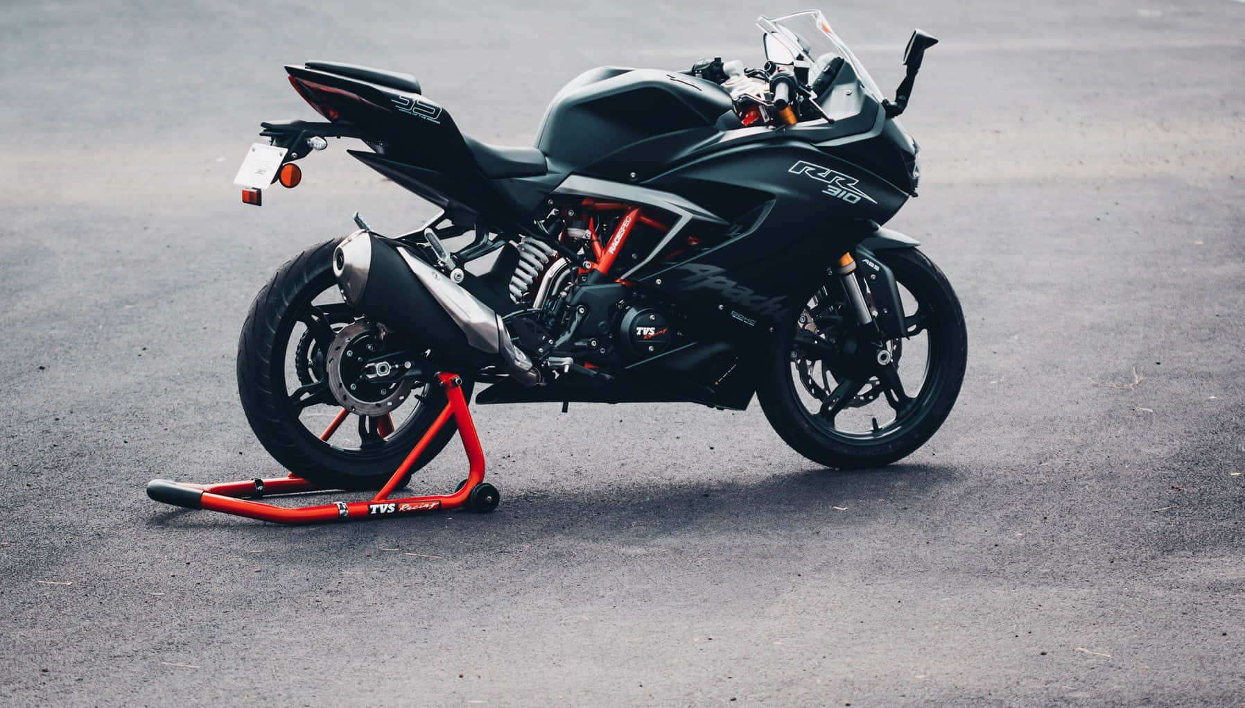 Black Sports Motorcycle Parked Background