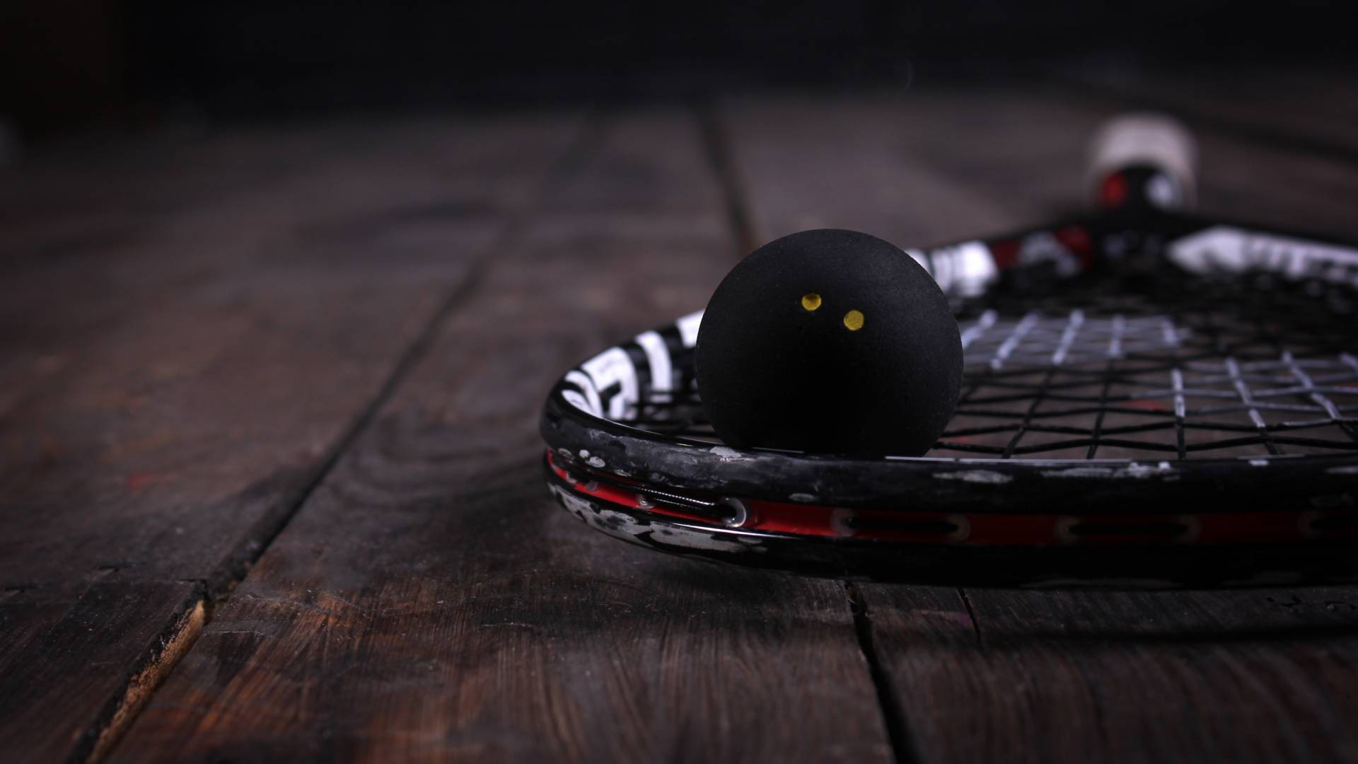 Black Squash Racket And Ball Background