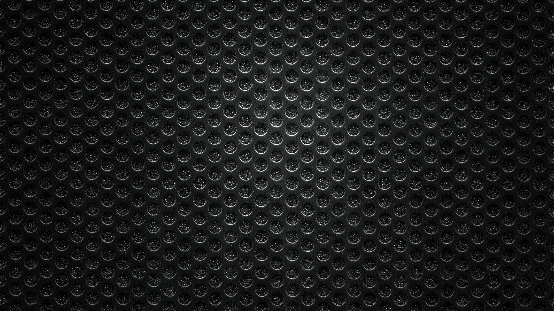 Black Texture Holes On Wall Background