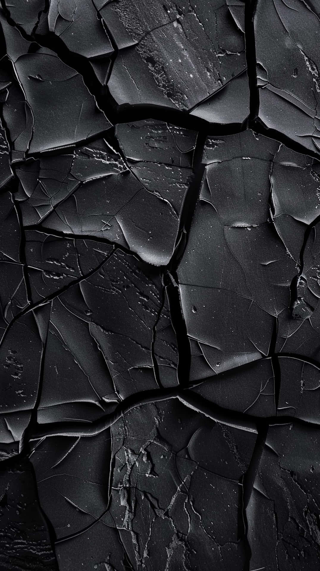Black Textured Surface Cracks Background