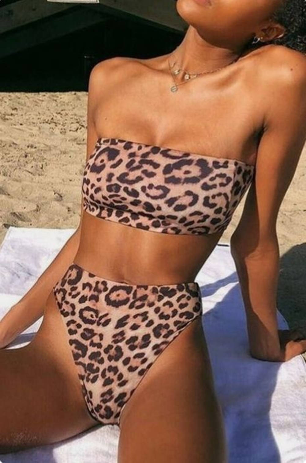 Black Woman In Bikini Cheetah Print Background