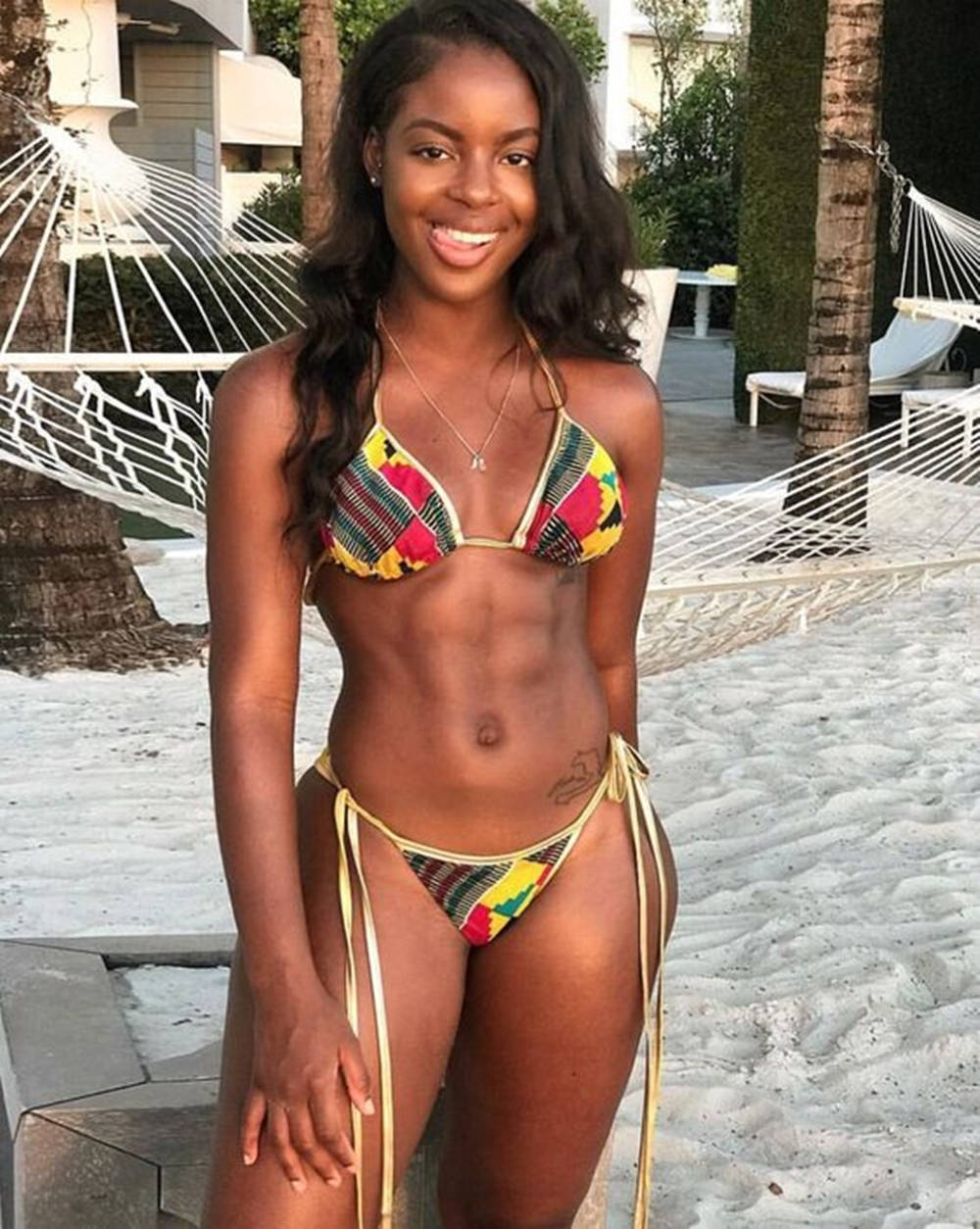 Black Woman In Bikini Tongue Background